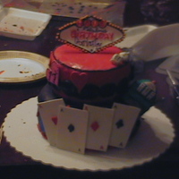 Gamblin' Grandma A co-worker had me make this cake for her mother turning 63. I made the Vegas sign using color flow. (I wish it turned out a little cleaner...