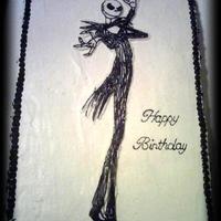 Jack The Pumpkin King! I love this cake. It's Jack skellington with spiders on the corner borders, and you can't see it, but webs coming up the sides.