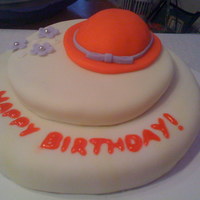Nan's Birthday This is a cake for my Nan's bday. She's part of the Red Hat Society so it seemed fitting to have a red hat on the cake. I tried...