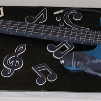Guitar Cake 3 days start to finish. I made this for my son's graduation party. He plays bass guitar in a band. Everything is edible except for the...