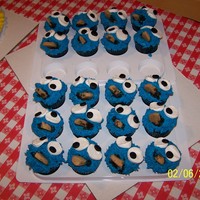 Cookie Monster Cupcakes Choc fudge cupcakes with piped BC. Eyes were made with large marshmallows cut in fourths. Used mini chocolate chip cookies for cookie...