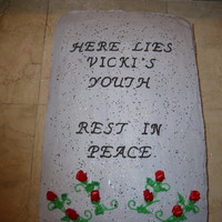 Headstone / Over The Hill 2 layer HUGE sheet cake (surprise party with 50 guests). Vanilla over choc fudge cake. BC frosting tinted pale grey; white and black sugars...