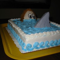 Shark! All BC frosting; swimmer is a mini-cake, the shark fin is RKT.