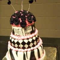 Senior Recital Cake This is a cake i made for my sister's Senior Music Recital =] It's Chocolate cake w/ chocolate chips, Pink buttercream on the...