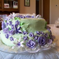 My Sweet Sixteen Cake =] My grandmom and i worked on this cake together - we made about 5 pans of flowers total, it was awesome!