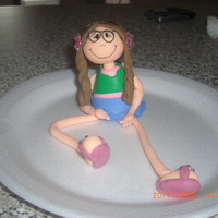 Muneca Patas Largas es un topper hecho en porcelana fria