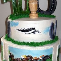 Horse Race Horses are hand painted on pieces of hard fondant (with added gum tex) props on top are fondant.