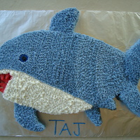 Shark Cut it out myself from the 11 x 15 pan. Used caramel apple flavored candy corn for the bloody teeth effect - stuck them in using toothpicks...