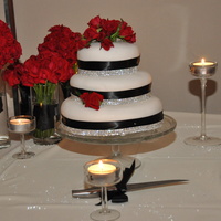 Made For Nieces Wedding the wedding was black and white theme used white fondant black ribbon and fresh sweet heart roses