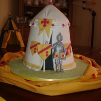 Knight Cake This was my son's 5th birthday cake. The cake was a madeira sponge cake with fondant icing. I painted the knight with edible silver...