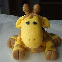 Fondant Giraffe my first time ever making a 3-D figure out of fondant! i got the idea from either from here or flickr.