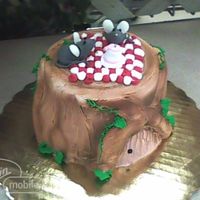Tree Stump Picnic Everything is shaped from icing, with the exception of the ears on the mice, which are made from piped confectionary coating, let to harden...