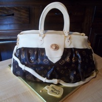 Lv Purse Marblecake , butter cream and fondant :) My first try at a purse.