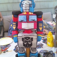Optimus By Janna Carved cake and crispie arms... All for a child who was not so impressed..lol