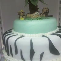 Deliahs Babyshower Cake fondant figures, white and chocolate cake