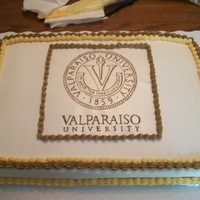 Grad She was going to that college so I made a waffer paper and drew the valpo logo.