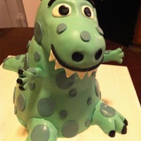 T-Rex Cake this cake was made from 2 6 in rounds and 2 8in rounds carved to shape. head and tale are rct.thanks for looking Juan