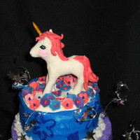 Unicorn Cake Butter cream with a white chocolate unicorn.