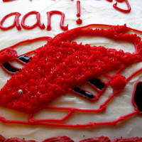 Red Ferrari Cake Red velvet cake with cream cheese icing.Was given 24hrs notice on this cake...and told that the bday boy likes cars and the color red...
