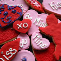 Valentines Cookies Sugar cookies topped with royal icing & fondant