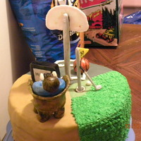 Multi Themed Cake I made this for a friends birthday this year...it was a triple layered 2 chocolate and 1 vanilla cake with raspberry buttercream filling......