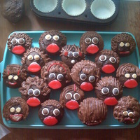 Funny Faces this was so simple to make and she loved it!! just a bunch of funny hair and face cupcakes!