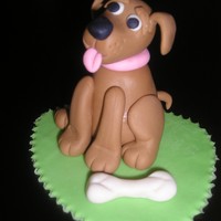 Dixie Here I tried my hand making a gumpaste dog taught by Lorraine McKay on YouTube Love your tutorials.