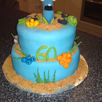 Dory This was for my sisters MIL her 60th.I did Dory from finding nemo because she is like the fish with a 2 second memory.The cake is 2 tied...