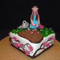 Spring Hey this cake was for a school raffle the cake raised $850.00 in raffle tickets sold.The cake is covered in Fondant.The sides of the cake...