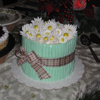Daisy Bouquet Cake This was my first try @gumpaste and fondant! I was inspired by Jalie 's photo. It was for my friends birthday this past weekend. The...