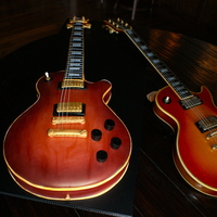 Gibson Les Paul Guitar Recreation of a Gibson Les Paul Custom guitar. Everything is edible except for the strings. The guitar is complete with tuning keys, treble...