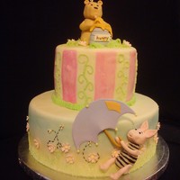 Winnie The Pooh Baby Shower Cake Winnie the Pooh baby shower cake. Got the idea from http://staceyssweetshop.blogspot.com/2009/07/classic-pooh-baby-shower-cake.html just...
