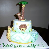Safari Cake Fondant with fondant accents and figures.