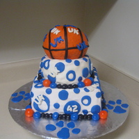 University Of Kentucky Wildcats Cake This cake is a UK themed birthday cake. Cake is red velvet with cream cheese icing. The basketball is the sports ball pan.