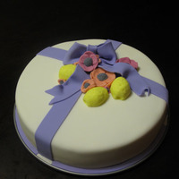 Lemon Poppy Cake A small cake just for practice - I wanted to try a fondant ribbon, and added poppy flowers and lemons because of the flavor. - It's a...