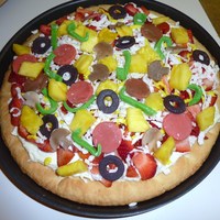 Pizza Dessert! Found this recipe on many sites on web....but changed a few things!Old fashioned Sugar Cookie recipe on bottom (browned up nicely as pan...