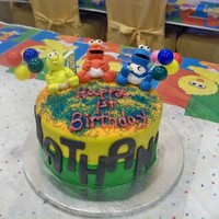 1St Birthday Sesame Street Cake I got the idea for this cake from youtube.com. The figures and decorations are made out of fondant. I made this cake for my nephew's...