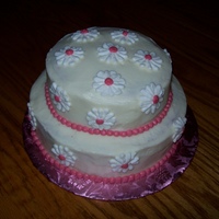 Mil Wedding Vow Renewal Cake Made this cake for my MIL for renewing her wedding vows. My first stacked cake. Cake is red velvet with cream cheese frosting. Daisies are...