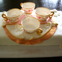 Teacup Cake for my husband's mom --was supposed to have a big teapot, too, but it was not a good day for making cakes, lol