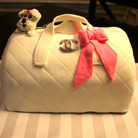 Purse Cake One of my mothers-in-law has a birthday on New Year's Eve and we won't be there, so I made this Chanel purse cake to take up to...