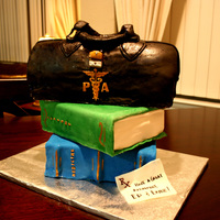Pa Retirement Cake Cake for two of my dad's PA friends who are retiring. The books are almond cake with amaretto buttercream and almond slivers, covered...