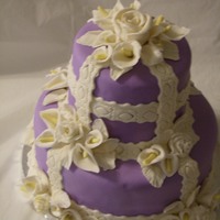 Mom's Birthday My mother loves purple. learned the calla lillies watching you tube. Really fun. the roses are hand molded chocolate. FUN FUN FUN