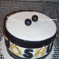Drum Cake My nephew plays the drums and pee wee league football. I just combined both.
