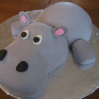 Happy Hippo! My first sculpted cake made for my best friends 16th birthday. Made with a modified chocolate cake mix recipe and chocolate frosting. Hippo...