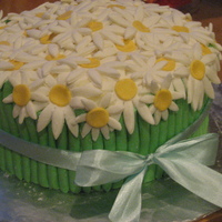 Bouquet Of Daisies mothers day cake for the best mommy in the world (: yellow cake with filled strawberry mousse and strawberry buttercream, decorated with...