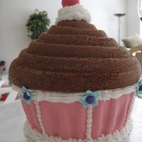 With A Cherry On Top! Mother's day cake for my step mom made with the Wilton giant cupcake pan. Yellow cake with a strawberry mousse filling and vanilla...