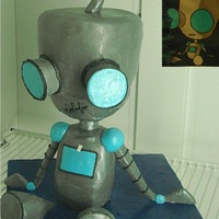 Robot Birthday Cake All edible...head is the cake..red velvet with cream cheese filling..legs are also cake..arms and eyes made from gumpaste and the body is...