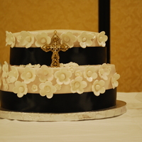 My Second Vow Renewal Cake Ever! This was the 2nd cake I did this past weekend. I just made up the flowers, simple but nice. I have soooo much to learn... Cake is Red...