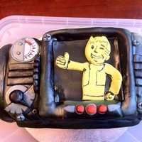 Pip-Boy This is from the video game fallout. I made it for my husbands birthday. It is homemade marshmallow fondant and all pieces are handmade and...