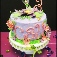 Tinkerbell Birthday This cake was for my niece's 3rd birthday. She loves Tinkerbell! Vanilla cake with vanilla crusting buttercream frosting. All the...